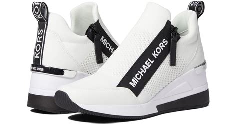 michael kors white wedge sneakers|Michael Kors white leather sneakers.